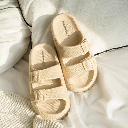 Tan sandals on bedding