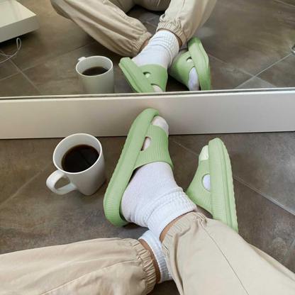 Men's green slides with coffee
